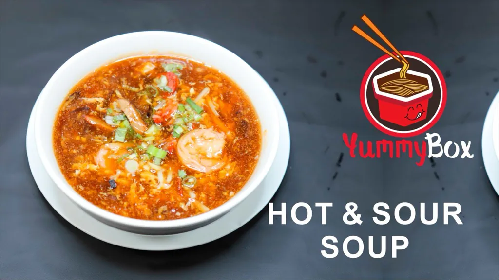 Spicy and sour soup with shrimp, veggies, and herbs at Yummy Box, a Chinese restaurant in Gilbert